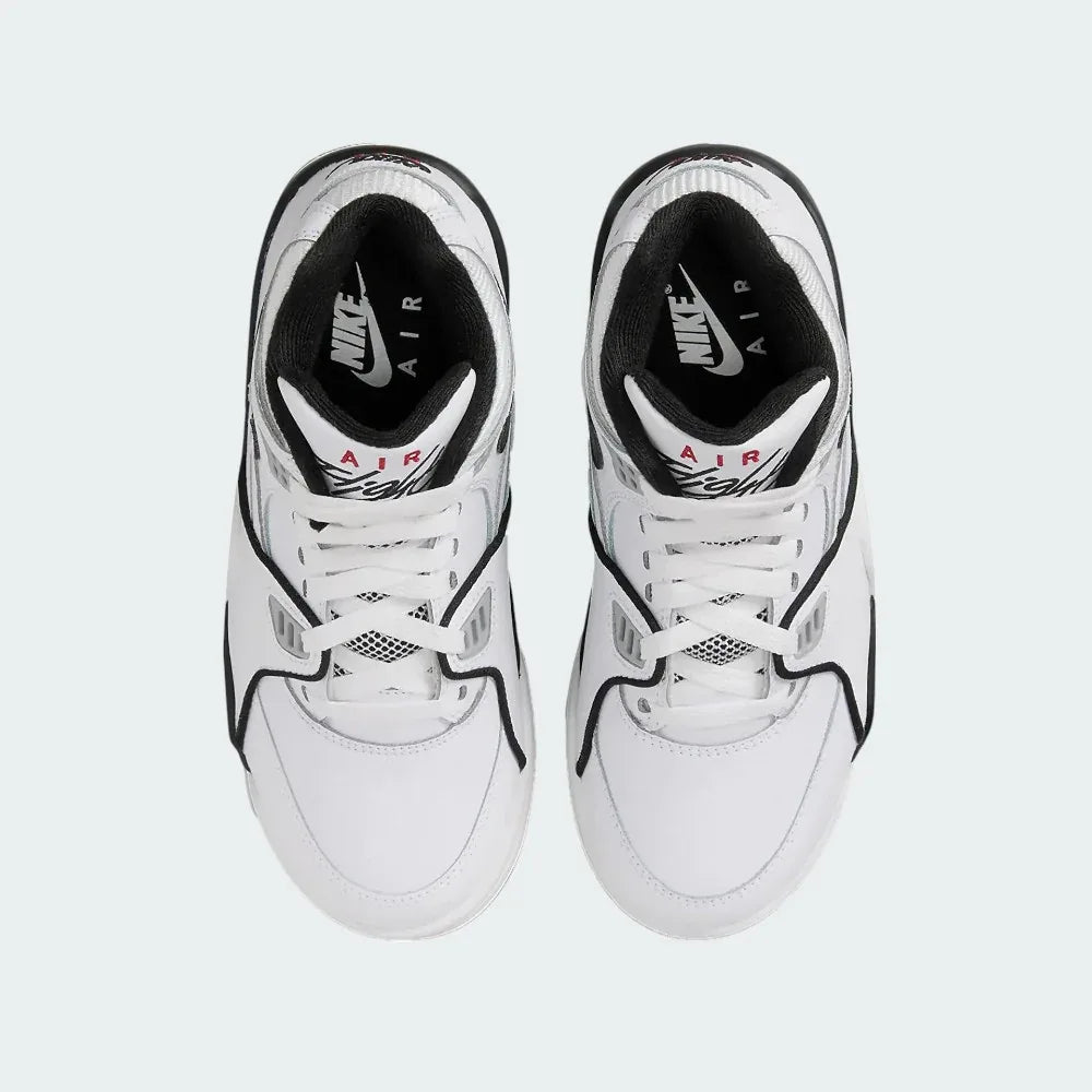 Top-down view of a pair of Nike Air Flight 89 Juniors' basketball trainers in white, highlighting their classic silhouette and lace-up closure.