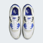 Nike Air Max 90 Premium Men's White Trainers HF3449-100 top view showing lace-up design, padded tongue, and clean monochrome look