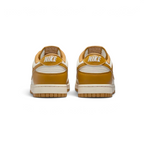 Rear view of the Nike Dunk Low Retro Men's wheat trainers, focusing on the contrasting black heel tab with white Nike branding.