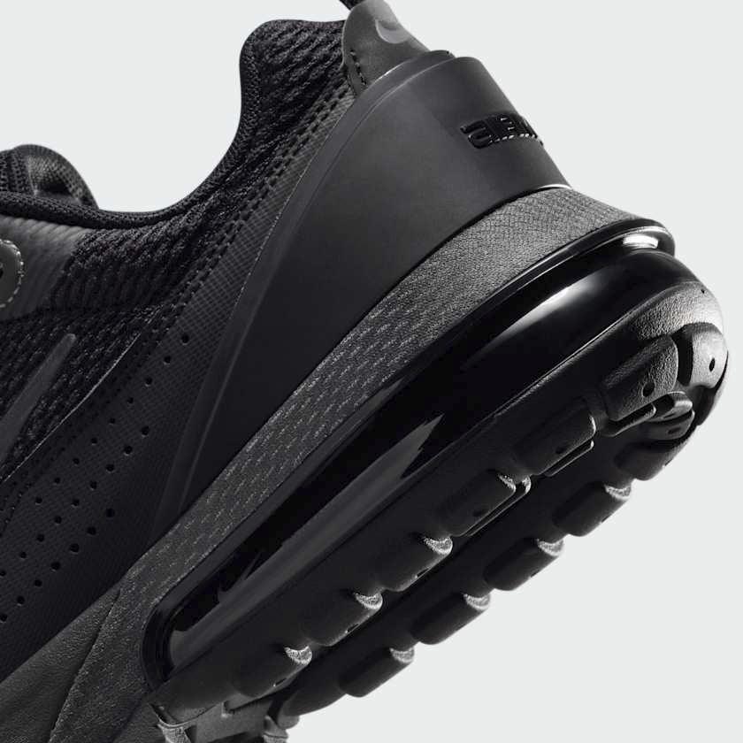 Detailed zoom on the outsole and midsole of the Nike Air Max Pulse Juniors' trainers, highlighting the unique point-loaded Max Air cushioning system and rubber outsole.