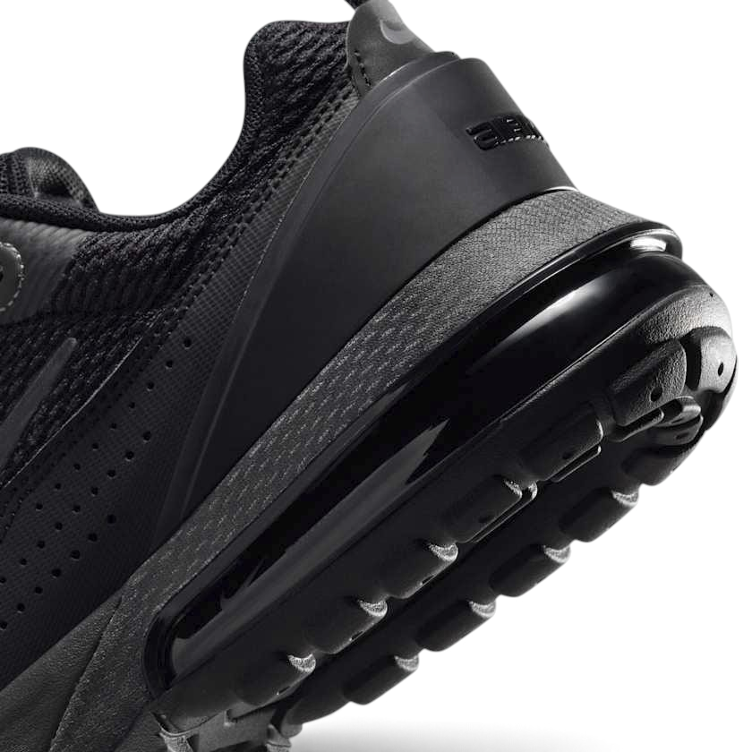Detailed zoom on the outsole and midsole of the Nike Air Max Pulse Juniors' trainers, highlighting the unique point-loaded Max Air cushioning system and rubber outsole.