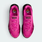 Focuses on the locked-in lacing layout, displaying the perfect symmetry of the technical fuchsia tongue and the seamless reinforcement skins guarding the front toe box.