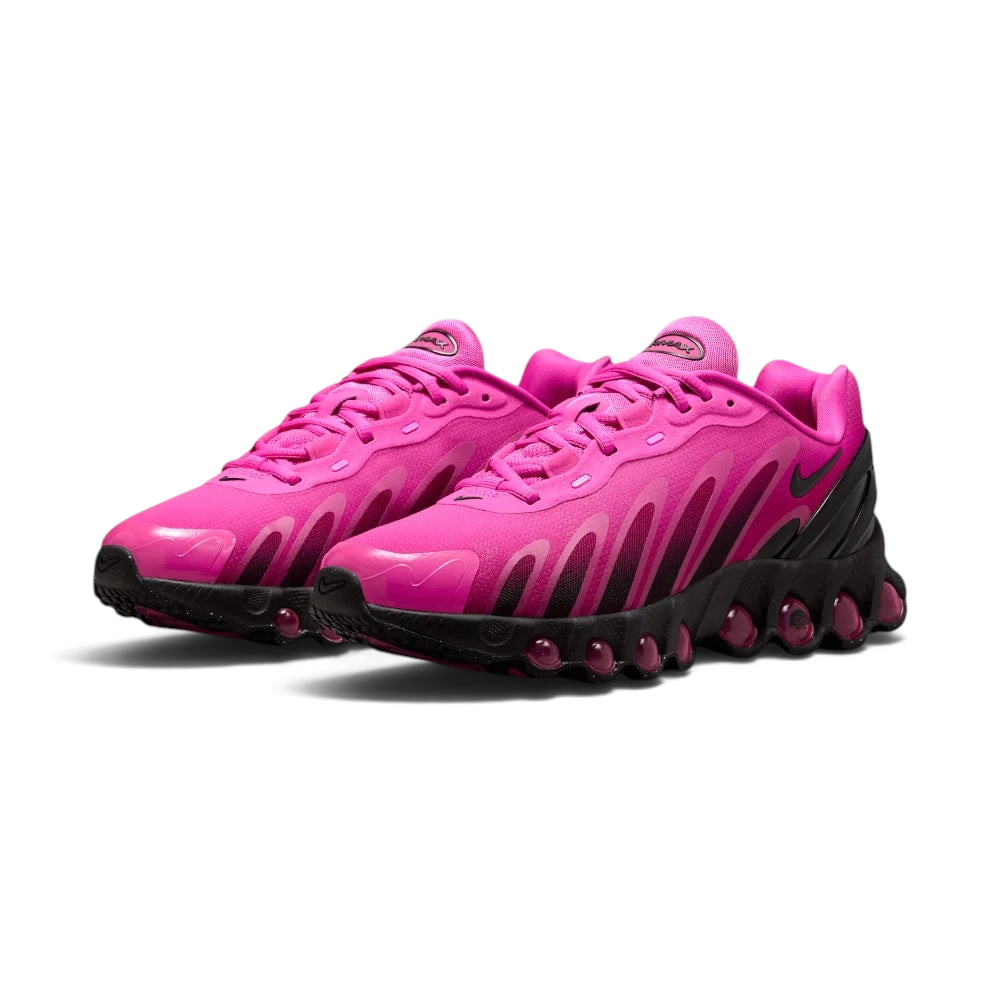 Emphasising the low-slung, futuristic athletic silhouette and the professional distribution of the high-contrast pink branding markers.