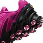 Highlights the "unreal" clean finish where the upper fuchsia textile mudguard seamlessly bonds onto the top rim of the multi-pod air capsule.