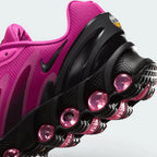 Highlights the "unreal" clean finish where the upper fuchsia textile mudguard seamlessly bonds onto the top rim of the multi-pod air capsule.