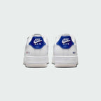 Rear view of the Nike Air Force 1 LV8 Juniors' white trainers, focusing on the heel panel and Nike Air branding.