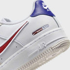 Detailed zoom on the outsole and midsole of the Nike Air Force 1 LV8 Juniors' white trainers, highlighting the cushioned midsole and durable rubber outsole.