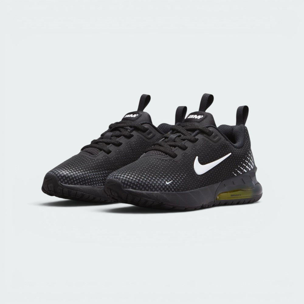 Emphasising the athletic, forward-leaning stance of the trainers and the sharp contrast between the black upper and the popping Sonic Yellow Air unit windows.