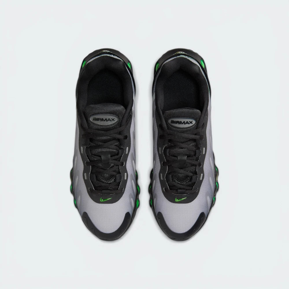 Looking down at the classic lacing system, the sculpted mesh upper, and the reflective accents on the tongue.
