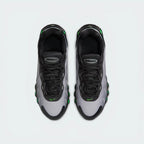 Looking down at the classic lacing system, the sculpted mesh upper, and the reflective accents on the tongue.
