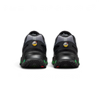 Focusing on the structured plastic heel clip and the glowing Volt accents within the Air system.