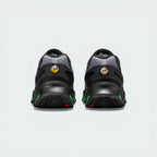 Focusing on the structured plastic heel clip and the glowing Volt accents within the Air system.