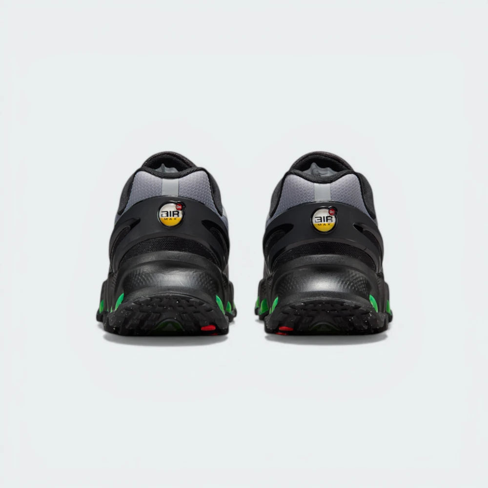 Focusing on the structured plastic heel clip and the glowing Volt accents within the Air system.