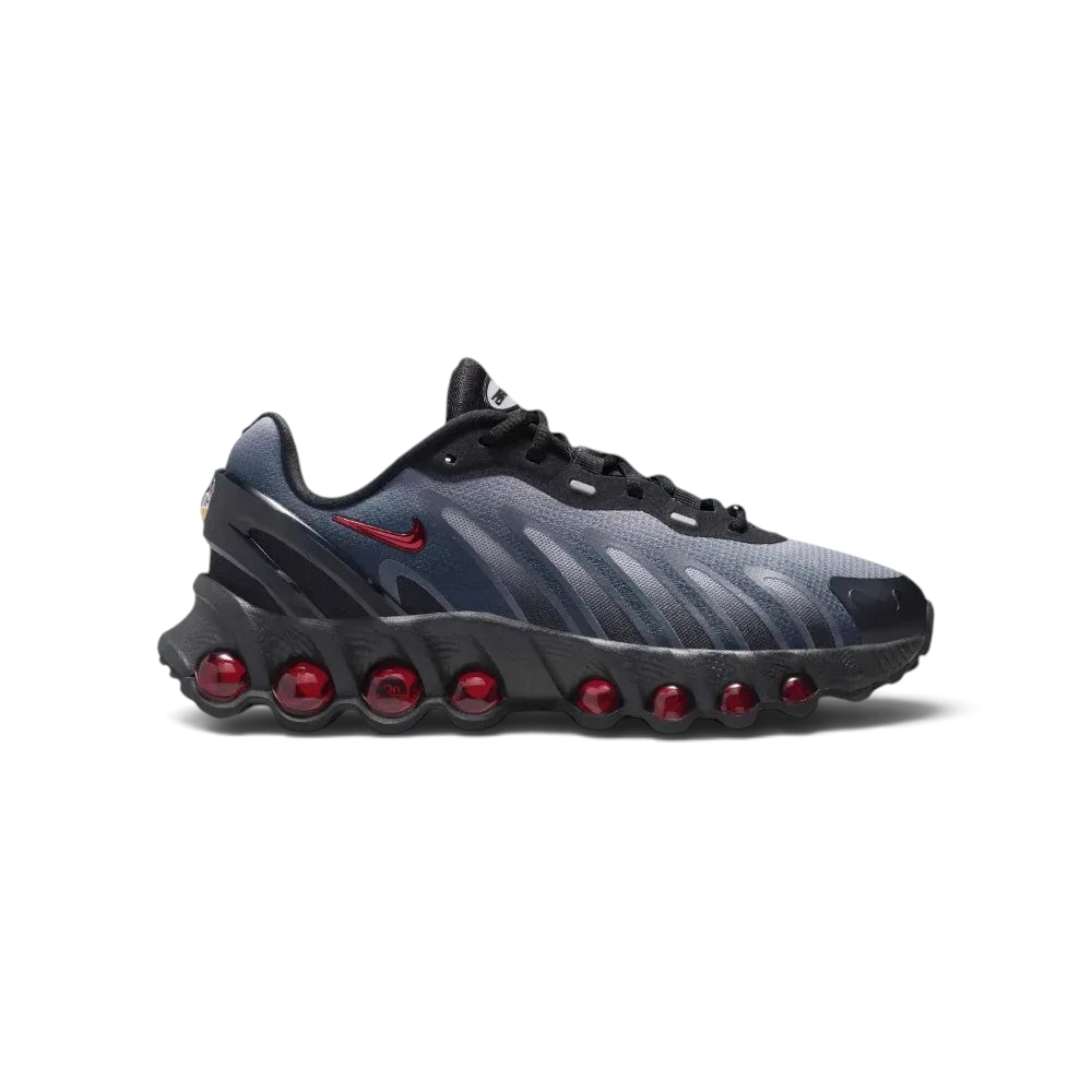 Side profile of the Nike Air Max DN8 Juniors' trainers in black mesh, showing the Gym Red Max Air units and the Light Smoke Grey midsole detailing. Main image