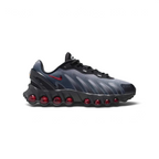 Side profile of the Nike Air Max DN8 Juniors' trainers in black mesh, showing the Gym Red Max Air units and the Light Smoke Grey midsole detailing.