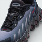 Close-up of the front, showing the detailed haptic mesh upper and the secure black lacing system for a locked-in fit.