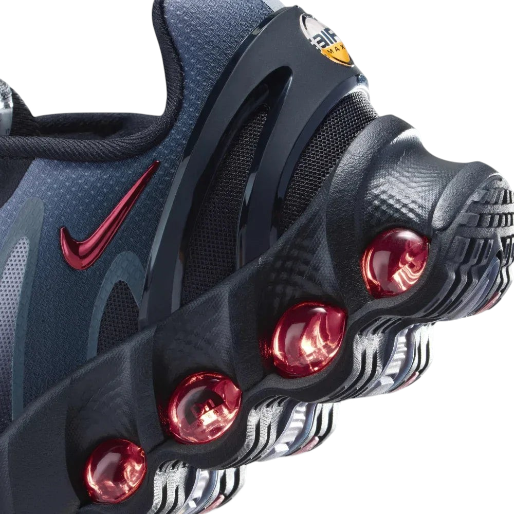 Close-up of the front, showing the detailed haptic mesh upper and the secure black lacing system for a locked-in fit.