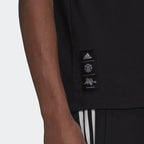 Highlighting the Special Label above the Hem, demonstrating the collaboration authenticity and "pro-level" finish.