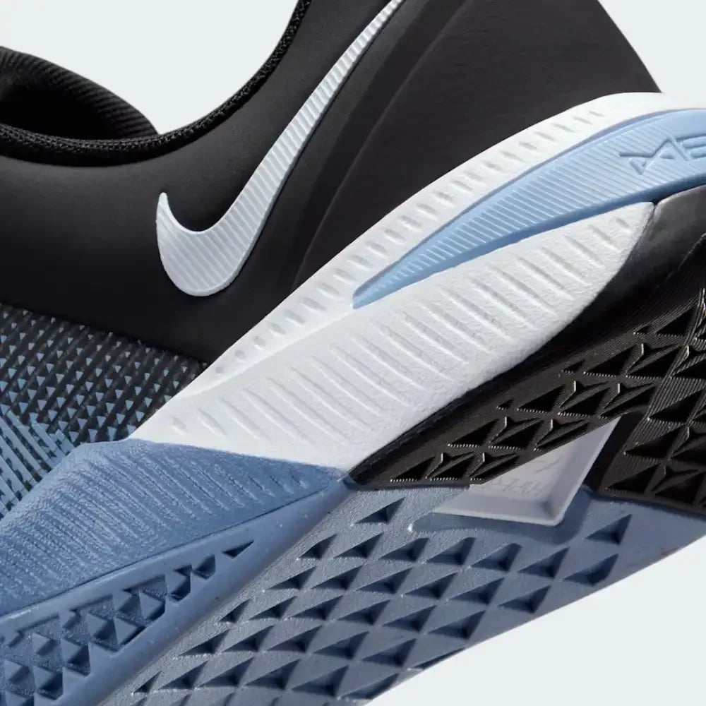Detailed zoom on the midsole, highlighting the dual-density cushioning and the Blue Hero rubber wrapping on the sidewalls.