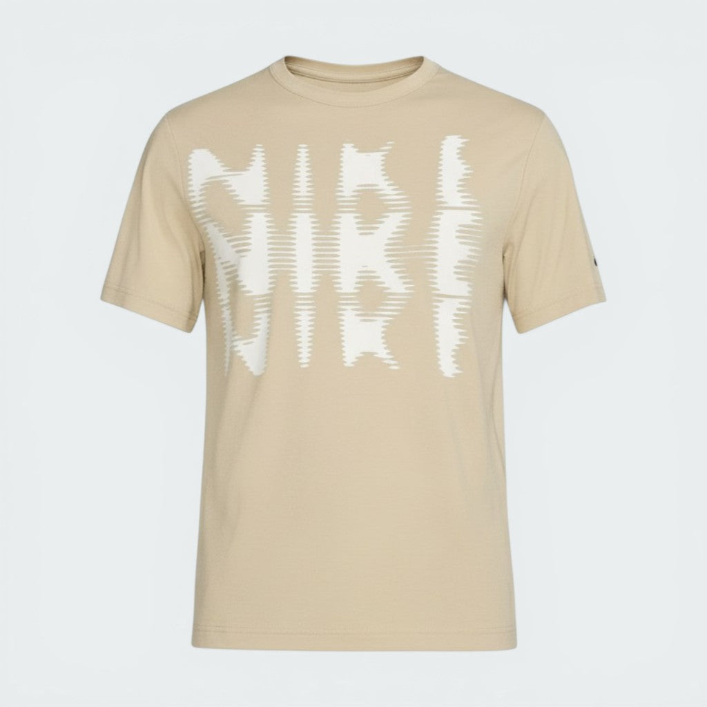 The Desert Khaki tee, highlighting the relaxed fit of the sleeves and the clean profile of the XL cut.