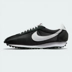 Outer Side profile of the Black/White Nike LD-1000, showcasing the iconic flared heel and the contrast white Swoosh on a mesh upper.