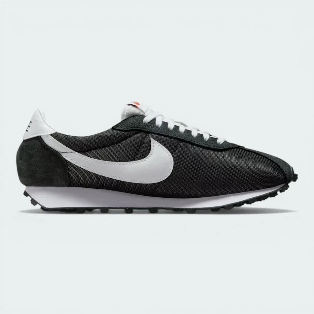 Side profile of the Black/White Nike LD-1000, showcasing the iconic flared heel and the contrast white Swoosh on a mesh upper. Main image