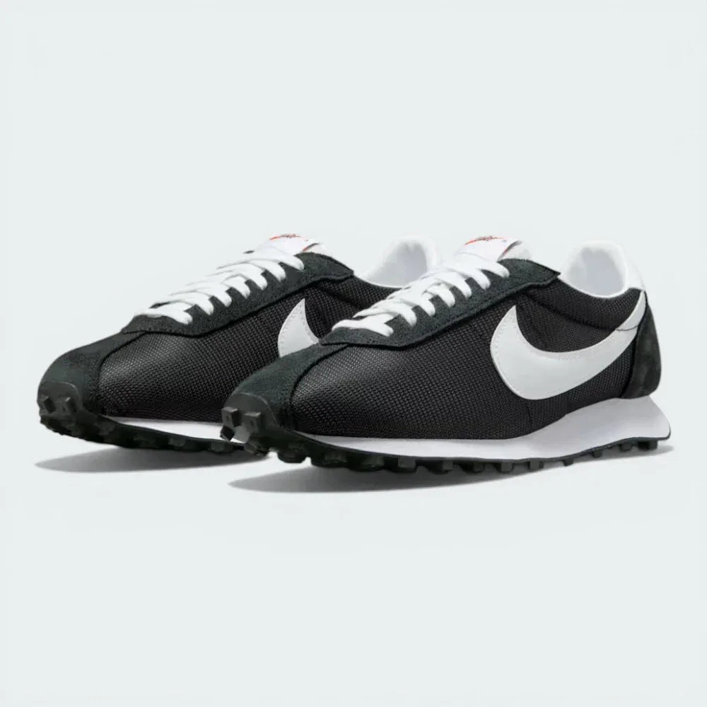Three-quarter view of the pair, emphasizing the vintage 70s aesthetic and the suede-to-mesh transitions.