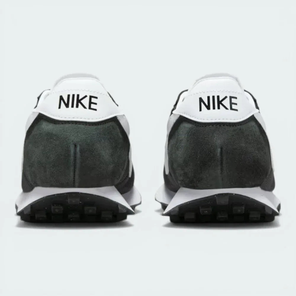Rear view of the LD-1000, focusing on the dramatic outward flare of the heel and the retro "Nike" branding.