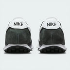Rear view of the LD-1000, focusing on the dramatic outward flare of the heel and the retro "Nike" branding.