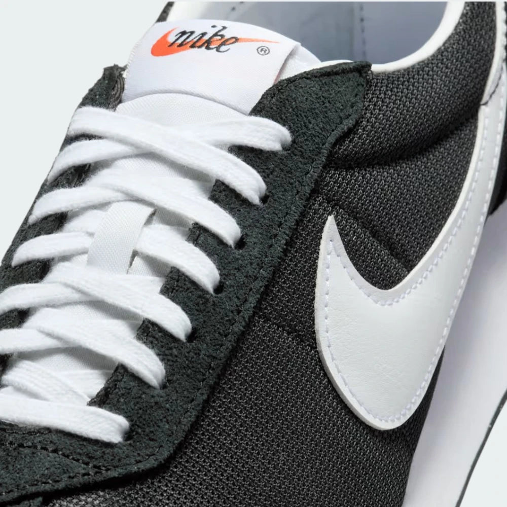 Close-up of the forefoot, focusing on the premium suede overlays and the airy mesh texture.