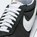 Close-up of the forefoot, focusing on the premium suede overlays and the airy mesh texture.