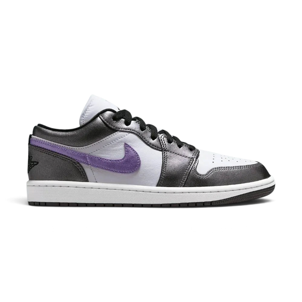Side profile of the Air Jordan 1 Low SE in white, showing the premium leather panels, monochromatic Swoosh, and the clean sail-toned midsole.