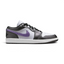 Side profile of the Air Jordan 1 Low SE in white, showing the premium leather panels, monochromatic Swoosh, and the clean sail-toned midsole.
