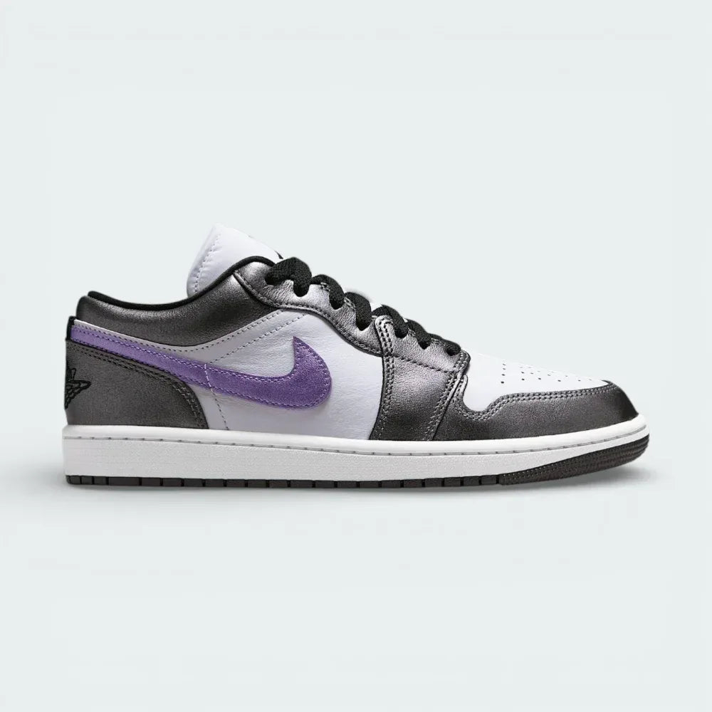 Side profile of the Air Jordan 1 Low SE in white, showing the premium leather panels, monochromatic Swoosh, and the clean sail-toned midsole. Main image