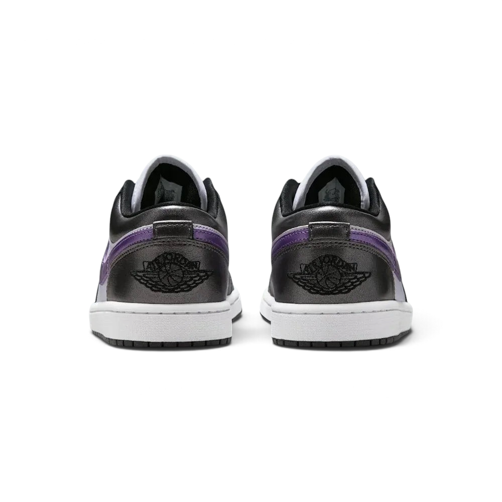 Rear view focusing on the meticulously embroidered Wings logo on the heel counter and the structured leather finish.