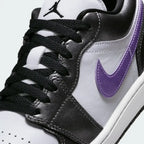 Close-up of the front, showing the quality of the white leather grain and the precision stitching around the toe cap.