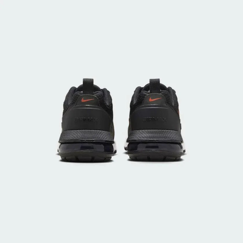 Rear view of the Nike Air Max Pulse Juniors' trainers, focusing on the prominent Max Air unit and heel branding.