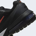 Detailed zoom on the outsole and midsole of the Nike Air Max Pulse Juniors' trainers, highlighting the unique point-loaded Max Air cushioning system and rubber outsole.