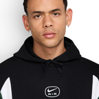 A close-up of the high-density print of the Nike Air logo on the chest.
