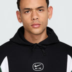A close-up of the high-density print of the Nike Air logo on the chest.