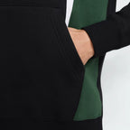 Highlighting the texture of the ribbed cuffs and the quality of the heavy-duty drawcords.