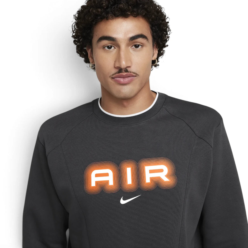 Zoom Looking at the Front Branding: Macro focus on the vintage-inspired printed chest graphics and contrasting colour pops against the fine-grained brushed fleece texture.