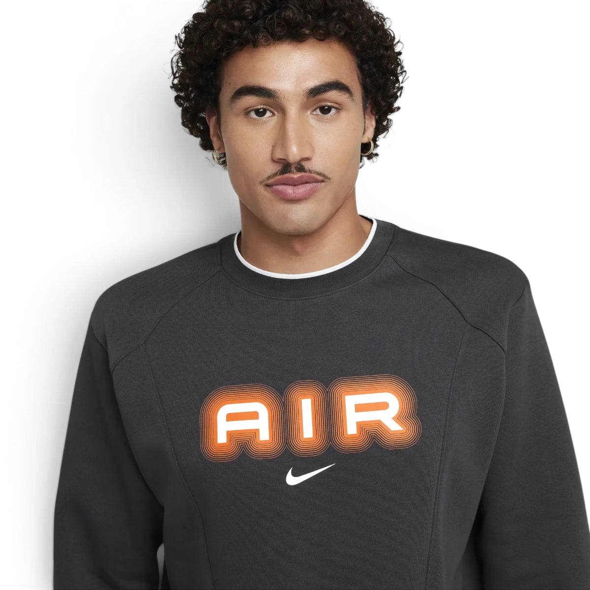 Zoom Looking at the Front Branding: Macro focus on the vintage-inspired printed chest graphics and contrasting colour pops against the fine-grained brushed fleece texture.