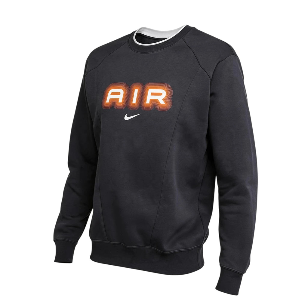 Side Profile Image: Studio lateral shot of the Nike Sportswear crew sweatshirt in anthracite, highlighting the clean shoulder seam, brushed fleece drape, ribbed side hem, and tapered sleeve cuff.