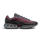 Nike Air Max DN Men's Black Trainers HM0708-002 side view showing streamlined black upper and dual-chamber Air unit in heel