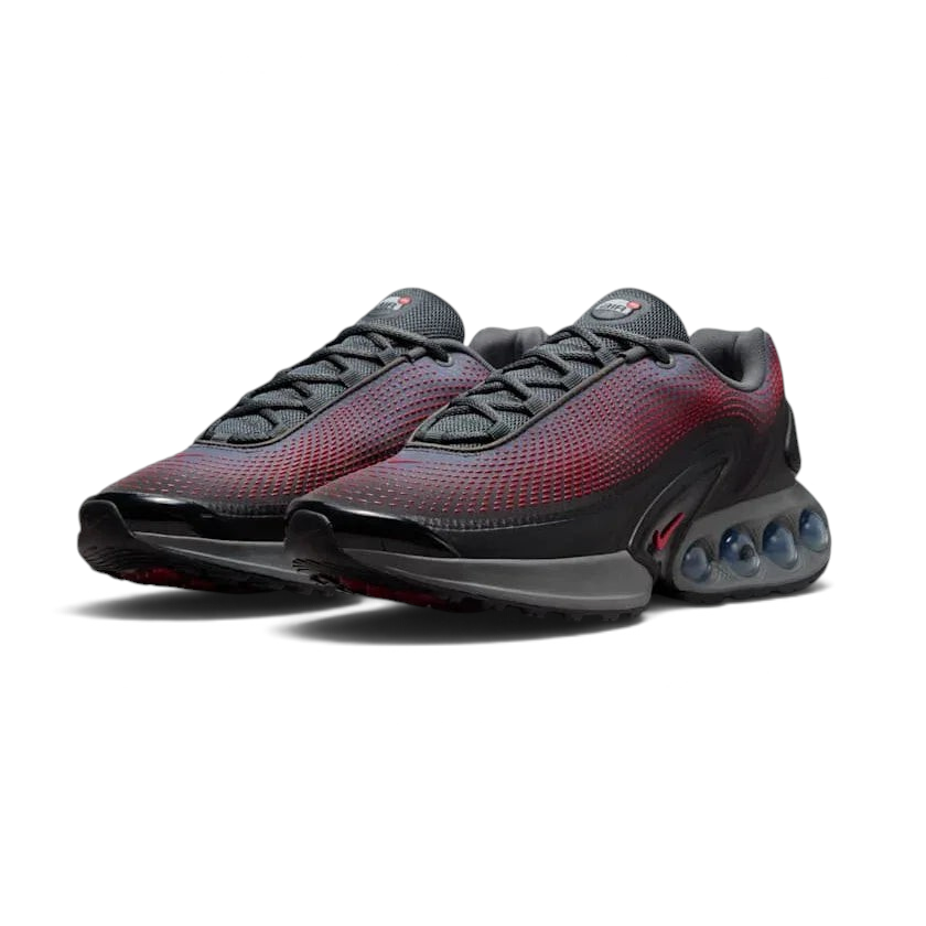Nike Air Max DN Men's Black Trainers HM0708-002 angled view showing futuristic midsole and layered upper construction