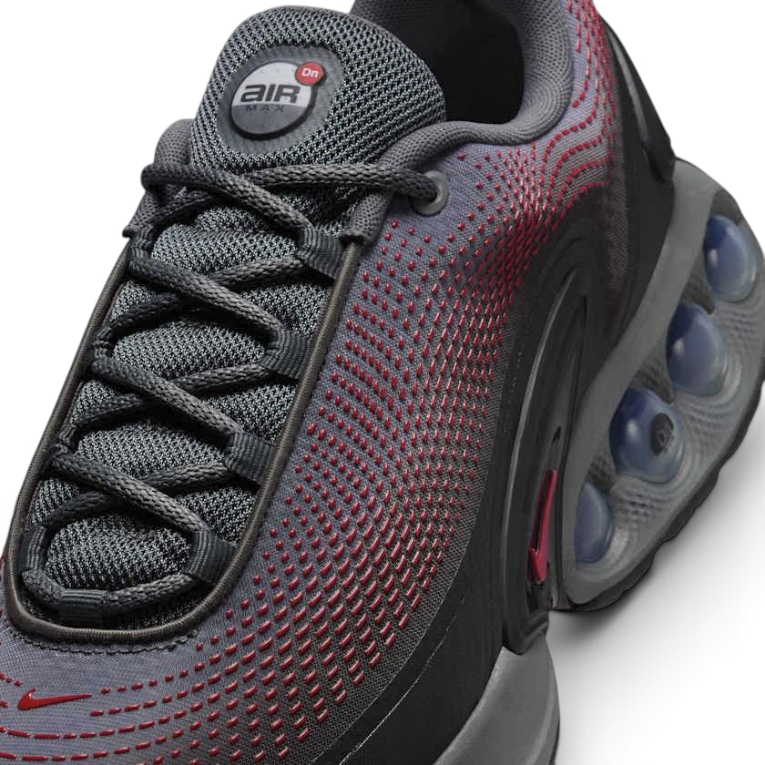 Rear underside close-up of Nike Air Max DN Men's Black Trainers HM0708-002 heel with visible dual-pressure Air units and outsole detail
