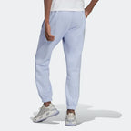 Adidas Trefoil Linear Men's Sweat Pants in violet, back view showcasing the plain design, ribbed cuffs, and comfortable fit.