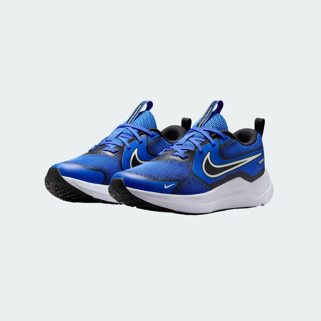 Angled view of two Nike Cosmic Runner Juniors' blue trainers, side by side, showcasing their versatile design and cushioned profile.