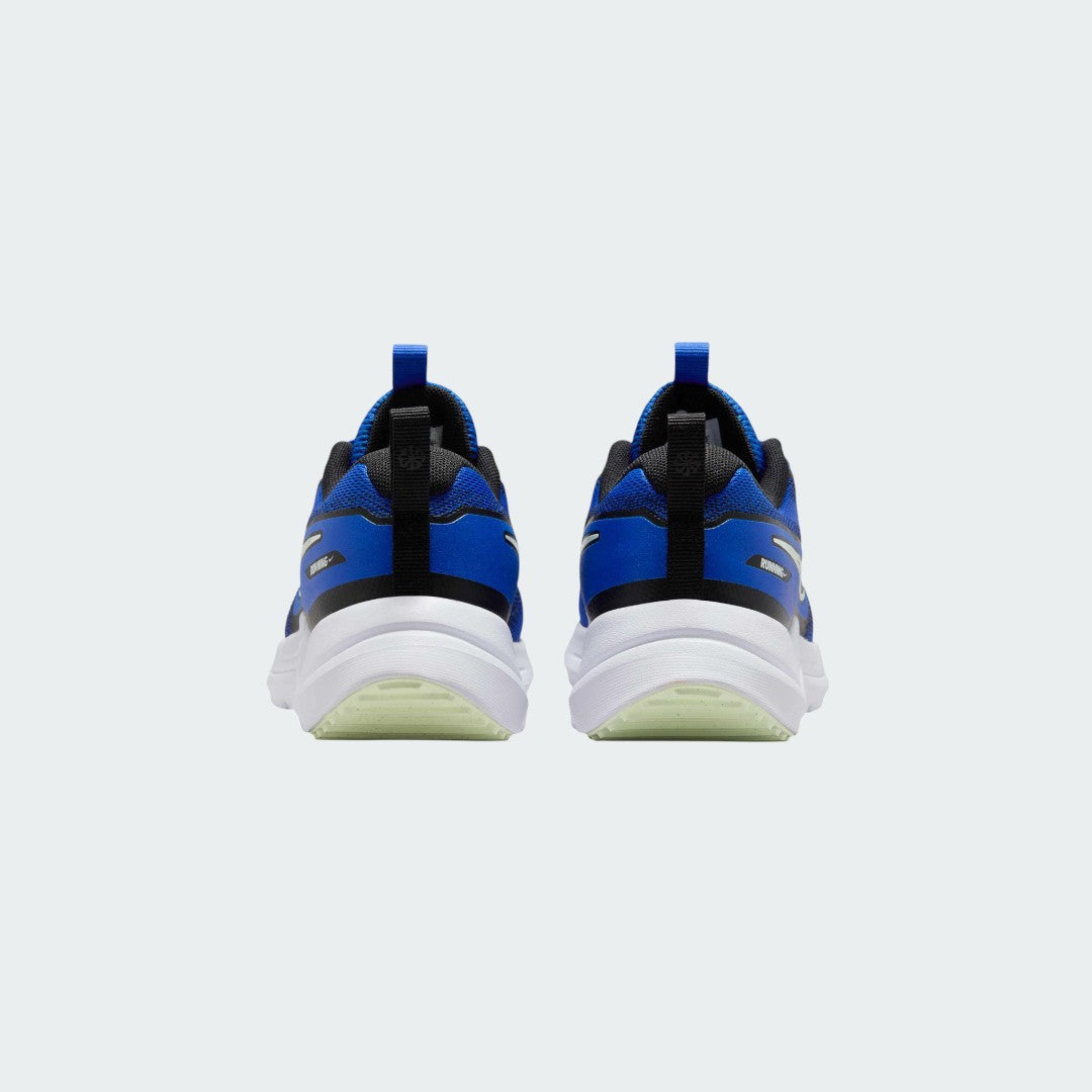 Rear view of the Nike Cosmic Runner Juniors' blue running trainers, focusing on the structured heel and subtle branding.